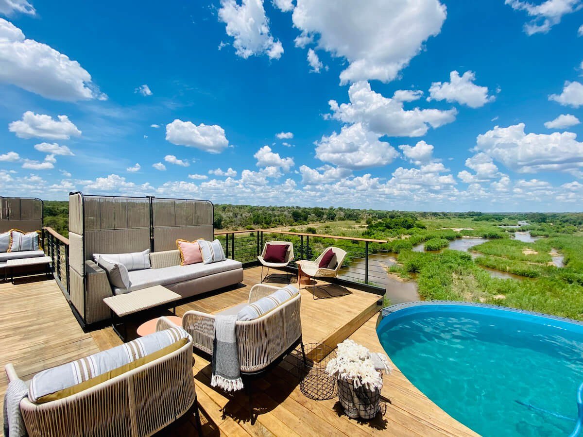 Private deck with a plunge pool overlooking the river at Kruger Shalati