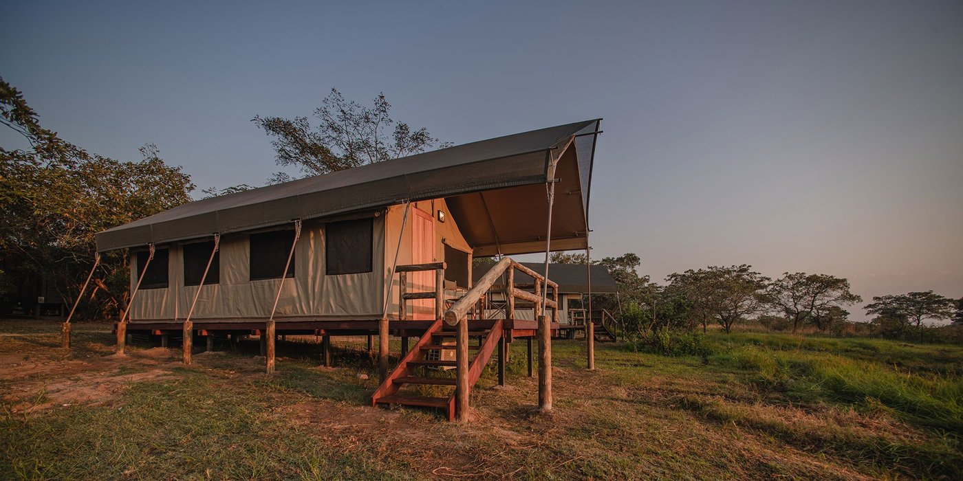Nkambeni Safari Camp raised safari tents at dusk bordering Kruger